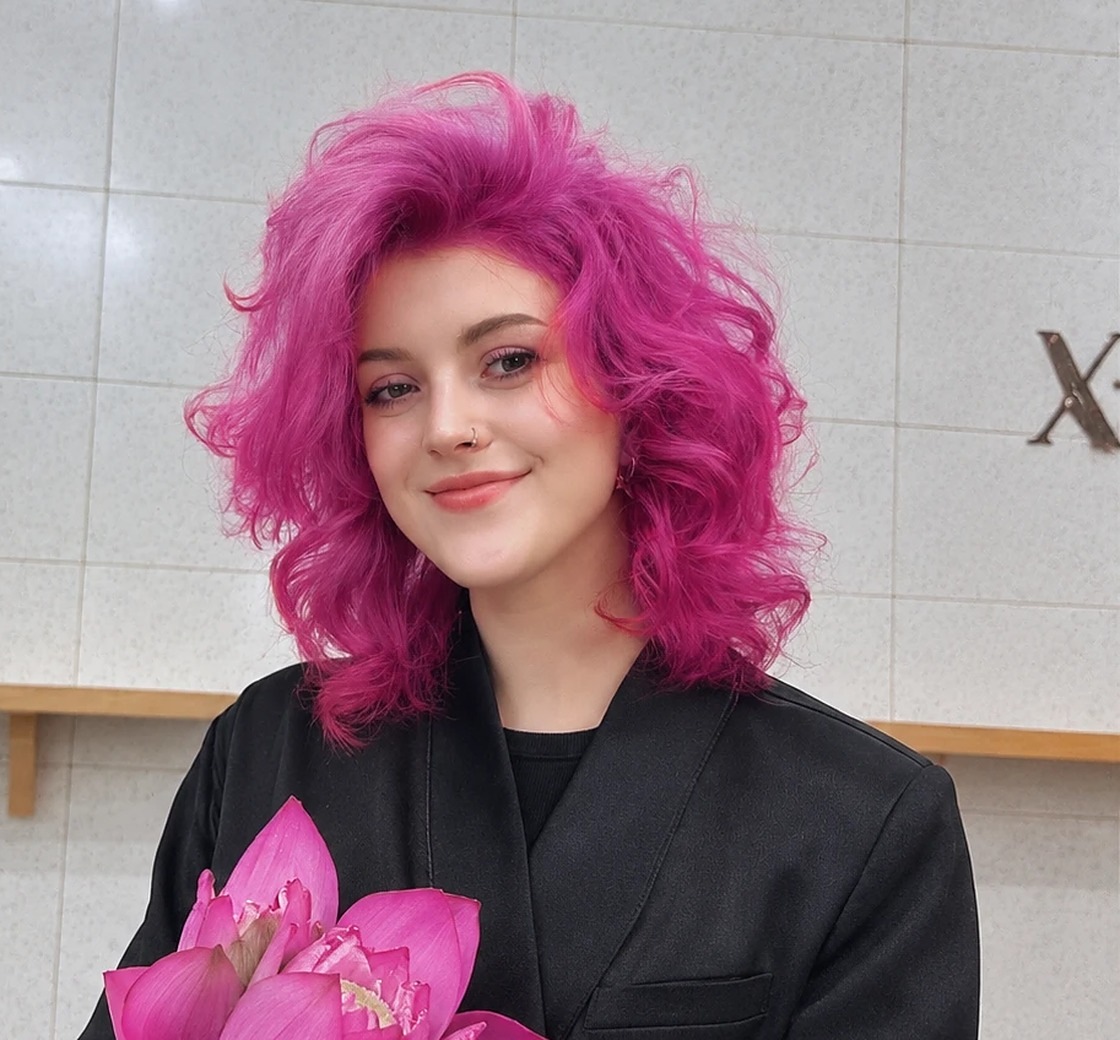 Vivid pink curls by X-Salon